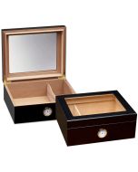 Two small and elegant glass humidors in black with see through glass on top and an external hygrometer, one humidor is closed and the other one is open