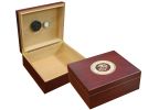 Two humidors in cherry finish one is open showing a humidifier and hygrometer the other one is closed with the marines logo engraved on top